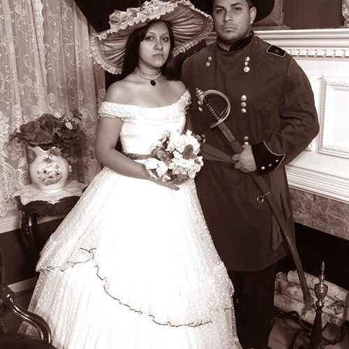 Couple Wearing Civil/Victorian Outfit
