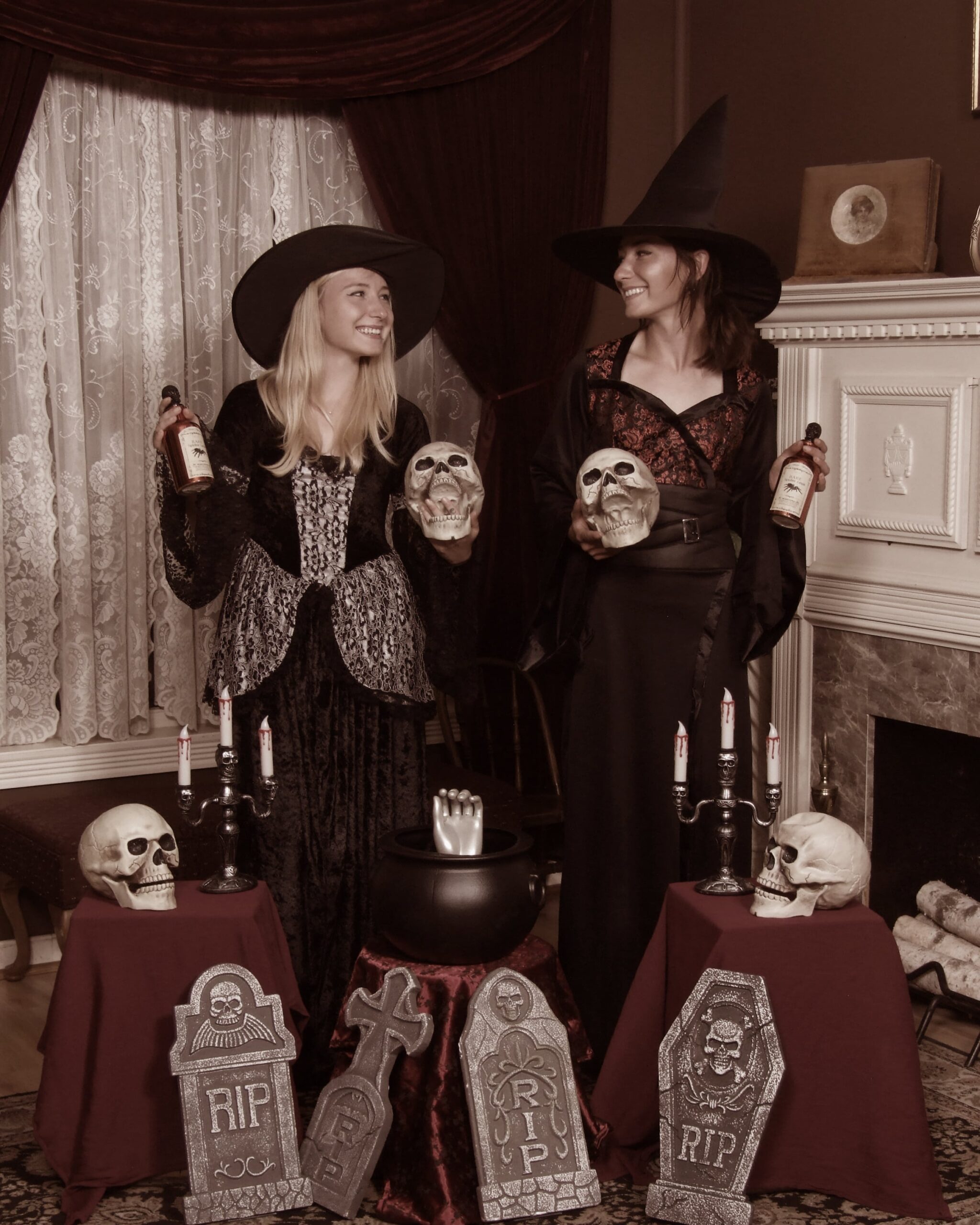 Two Sisters Holding Skull and Wine