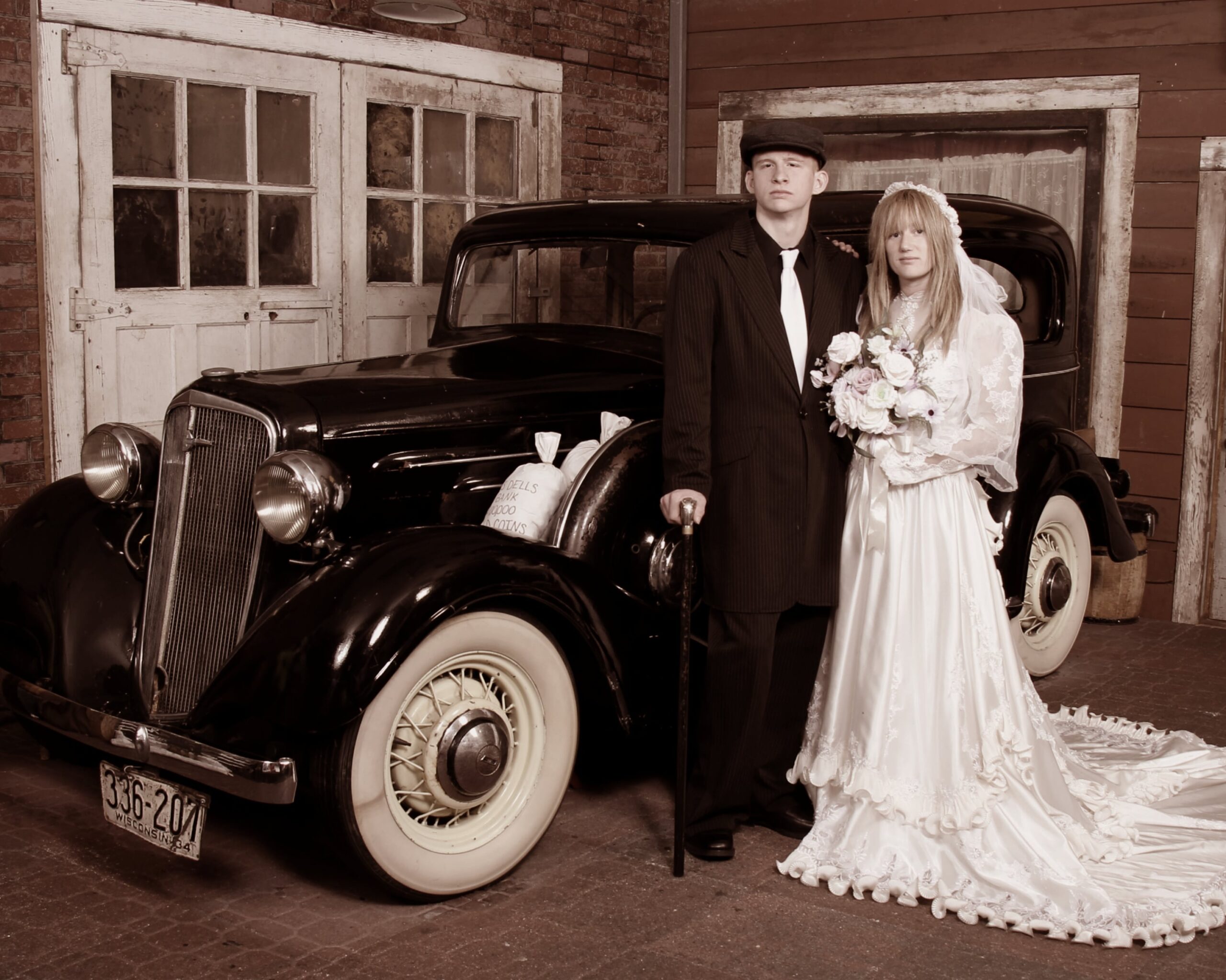 Married Couple on a Vintage Car